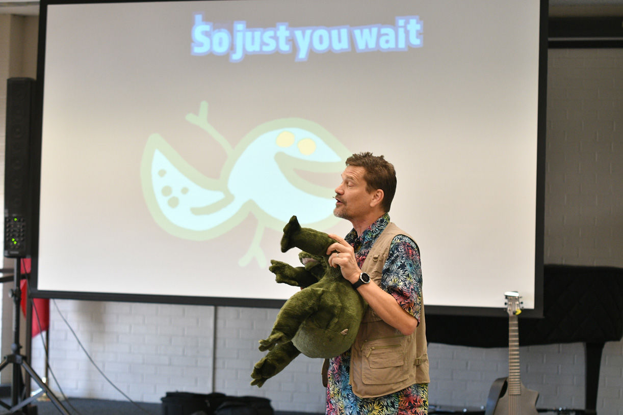 Singing zoologist Lucas Miller visits Bryan library